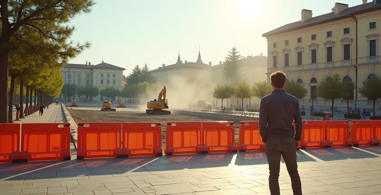 Cittadino osserva cantiere di riqualificazione parco con fondi PNRR